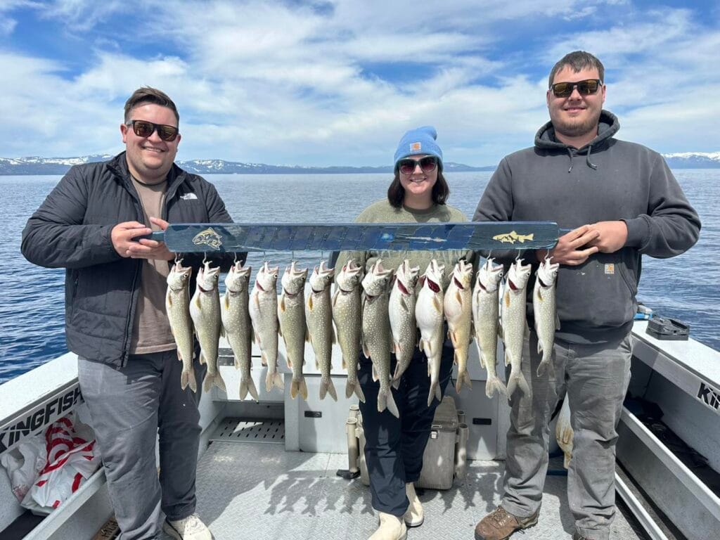 Group holding full limit of Lake Trout on Lake Tahoe charter with FishTahoe.com